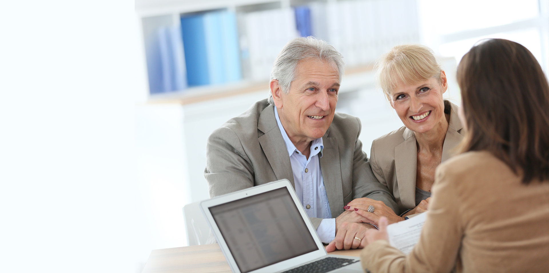 old couple talking insurance agent